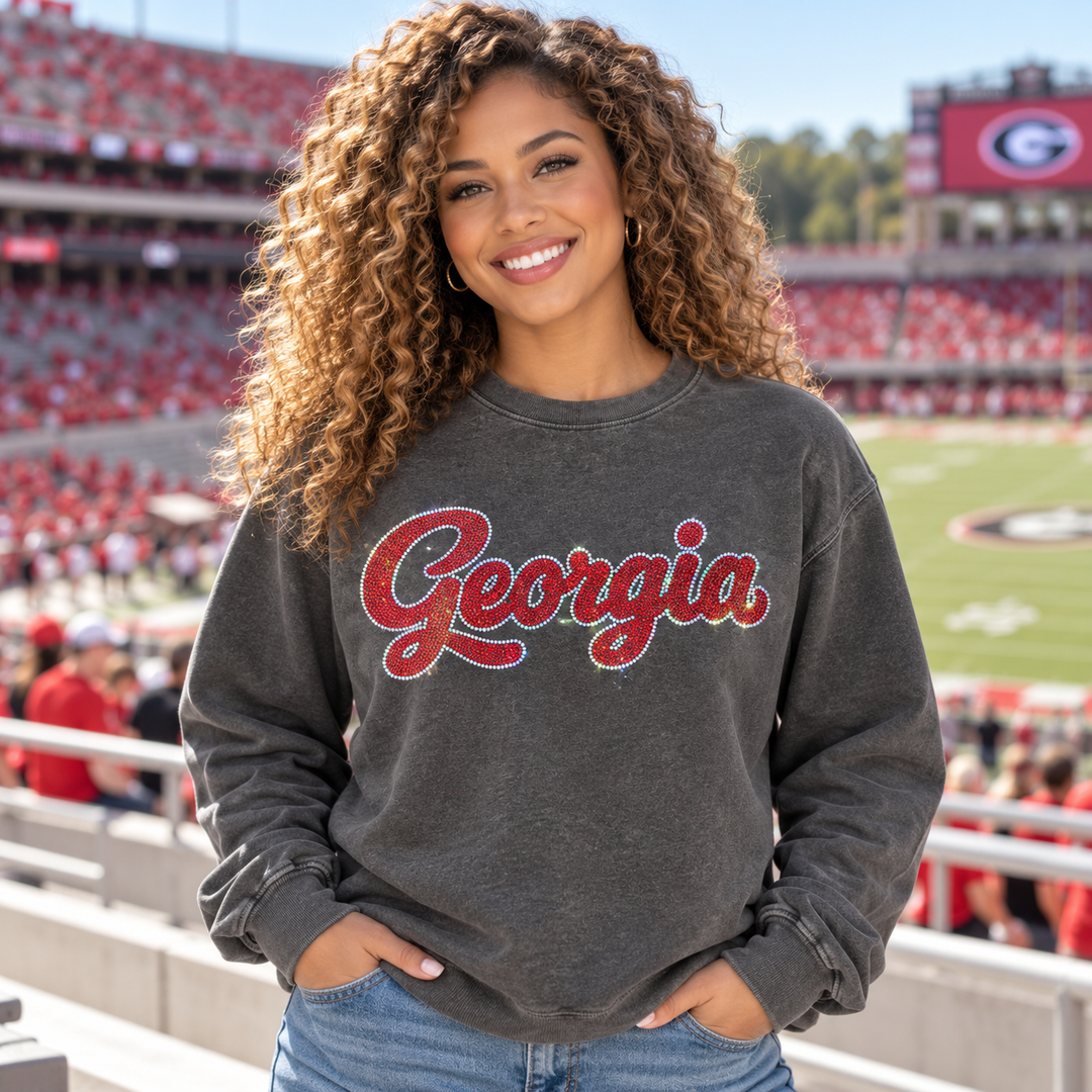 Mockup of red spangle bling "Georgia" script transfer on a charcoal sweatshirt